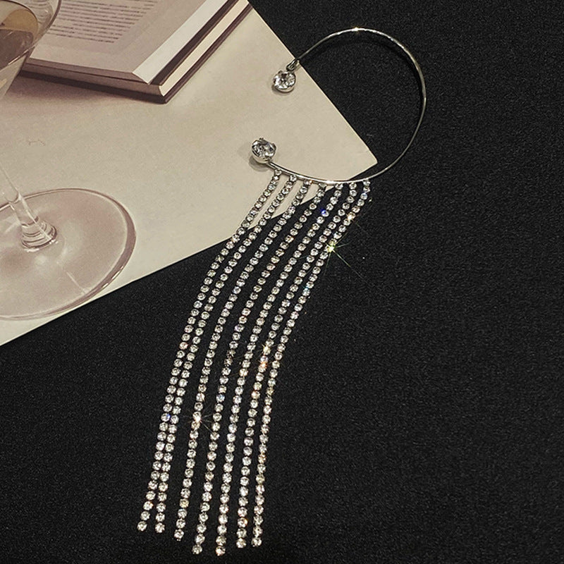 Boucles d’Oreilles Longues à Pompons
